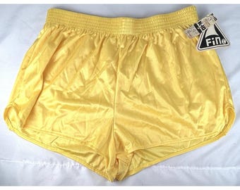 Pantalones cortos deportivos de nailon brillante color amarillo vintage para mujer, talla L, fáciles de poner, para gimnasio y atletismo.