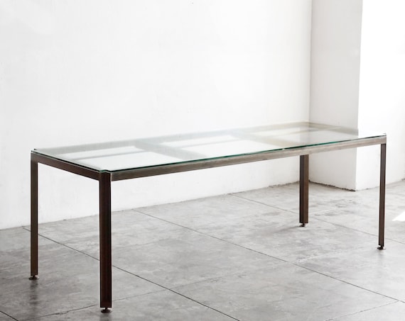 Angled glass coffee table deals