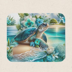 May include: A rectangular mouse pad featuring a sea turtle resting on a sandy beach shore. The scene includes turquoise ocean waves, white and blue tropical flowers, and lush green foliage under a bright sky with a distant tree on the horizon.