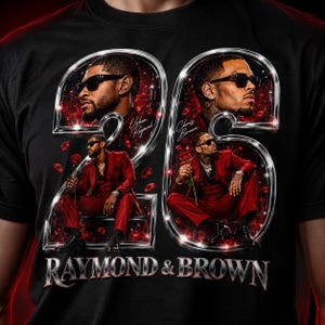 May include: A black t-shirt featuring a large graphic of the number 26 in metallic silver. Inside the numbers are portraits and full-body images of Usher Raymond and Chris Brown in red suits holding roses. The text reads Usher Raymond, Chris Brown, and RAYMOND & BROWN.