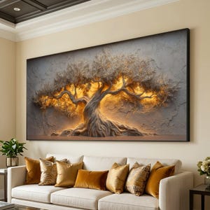 May include: A large rectangular wall art piece featuring a textured, sculptural depiction of an ancient olive tree with gnarled roots and branches. The artwork is illuminated from behind with a warm golden glow against a gray stone-like background.