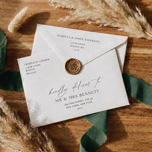 May include: Two white envelopes with black printed text and a gold wax seal. The top envelope shows the return address for Isabella & James Anderson. The bottom envelope is addressed to Mr & Mrs Bennett with the text Kindly deliver to.
