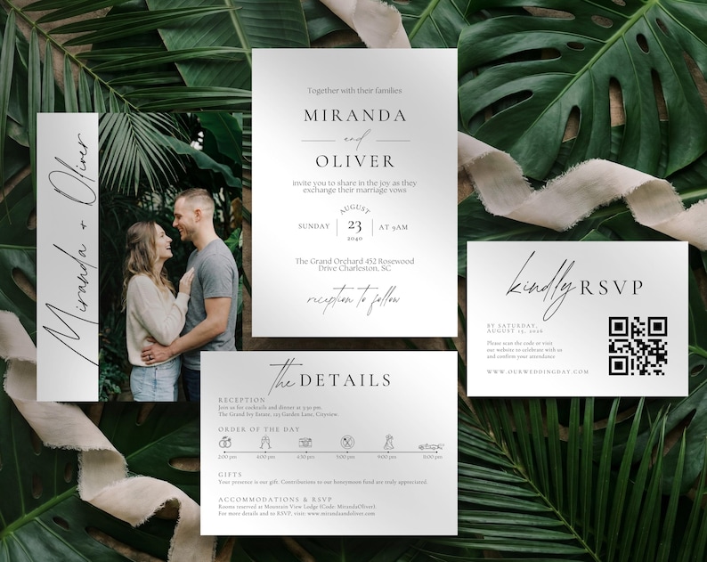 May include: Wedding invitation suite featuring a photo of a couple, with additional cards for details and RSVP. The suite includes the names "Miranda and Oliver" in elegant script, set against a backdrop of lush green foliage and a neutral ribbon.