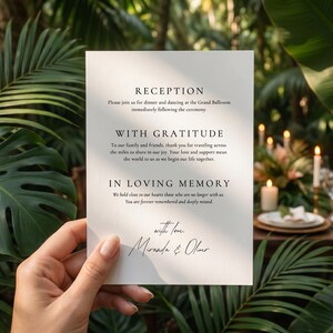 Minimalist wedding day program cards held in hands, modern minimalist aesthetic.
