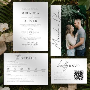May include: A wedding invitation suite featuring a photo of a couple, and cards with details. The suite includes a main invitation, RSVP card with a QR code, and a details card. The text is in a modern font, with the names "Miranda and Oliver".