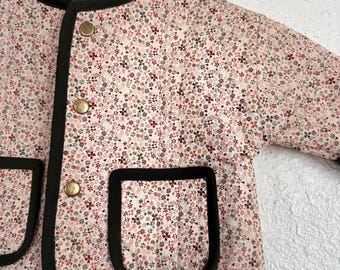 Chaqueta acolchada hecha a mano para niños y bebés.