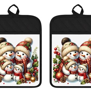 May include: A pair of rectangular pot holders with black quilted trim and a hanging loop. The center features a printed illustration of a family of four snowmen wearing red and beige knit hats and scarves, surrounded by holly, red berries, and ornaments.
