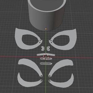 May include: A digital 3D model layout featuring a semi-circular top component, two large eye-shaped pieces, two small nose-like elements, a horizontal bar, two perforated rectangular strips, and four curved, pointed appendages arranged symmetrically.