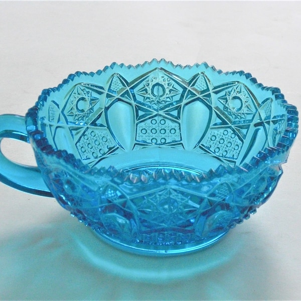 Vintage Turquoise Blue Handled Nappy Bowl Sawtooth Edge Stars Panels Made by West Virginia Glass