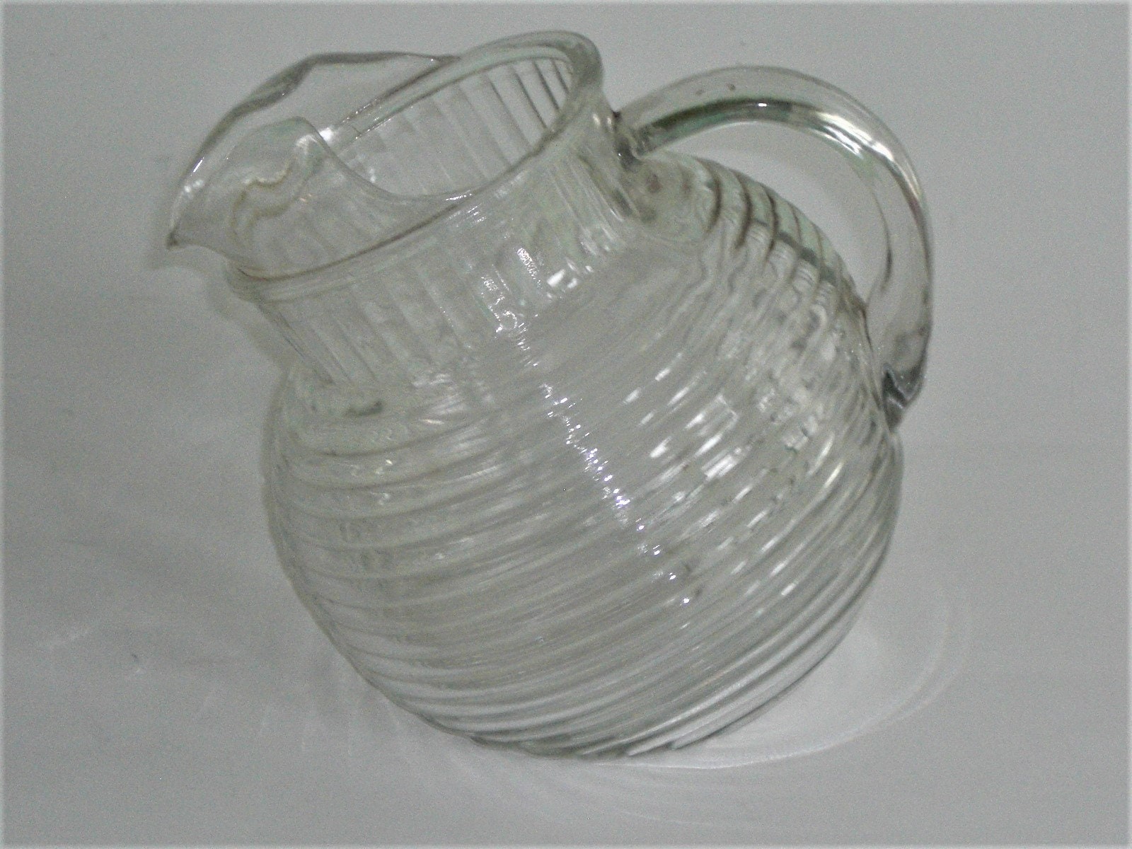 Small Tilted Glass Pitcher – Nancy Thomas Gallery