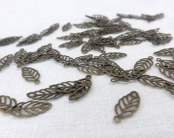 Bronze leaf charms 100 pieces metal charms antiqued open leaf drops jewelry supply