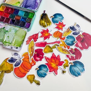 May include: A collection of watercolour painted autumn-themed illustrations, including pumpkins, gourds, leaves, and acorns. The illustrations are cut out and arranged on a white background.