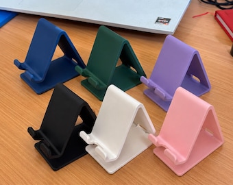 Soporte de plástico para teléfono – Compatible con teléfonos y tabletas. Varios colores disponibles (fabricado bajo pedido).