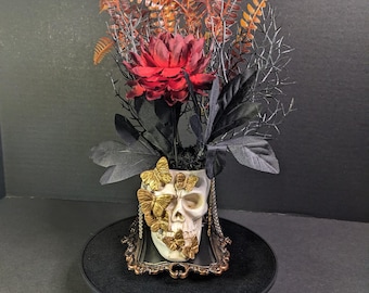 Gothic Skull Floral Arrangement with Gold Butterflies on Decorative Jewelry Dish