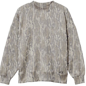 May include: A long-sleeve crewneck sweatshirt featuring a light tan and grey tree bark camouflage pattern. The garment has a ribbed collar, cuffs, and hem, with a small rectangular black label on the lower left side displaying the text MOSSY OAK.