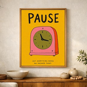 May include: A rectangular wall art print with a vibrant yellow background featuring a pink and orange vintage-style clock in the centre. The text PAUSE is printed in black at the top, and the text NOT EVERYTHING NEEDS AN ANSWER TODAY is at the bottom.