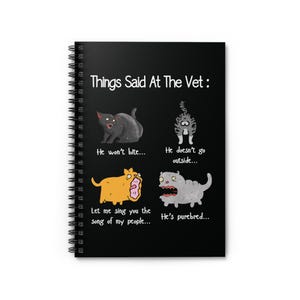 May include: A black spiral notebook with a white background and the text "Things Said At The Vet:"  Four cartoon animals are shown with humorous captions. The animals are a black cat, a grey cat, an orange dog, and a grey dog.