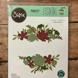May include: A package of 12 die-cut floral designs for crafting. The dies are made by Sizzix and are part of the Thinlits line. The package features a green and red floral design with the text "Lisa Jones" and "665285".
