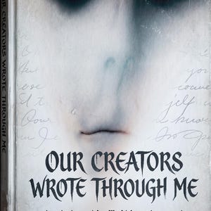 May include: A book titled Our Creators Wrote Through Me: An Automatic Writing Account of Human Creation. The cover features a ghostly, pale, blurred face with dark eyes and mouth, overlaid with faint, cursive handwriting on a white background.