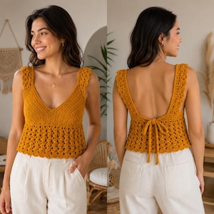 May include: A mustard yellow sleeveless crochet top featuring a deep V-neckline, wide scalloped shoulder straps, and a textured openwork bodice. The back displays a low-cut design with a central tie closure and a scalloped hemline finish.