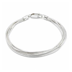 May include: A silver bracelet with multiple strands of fine, flexible metal, woven together in a circular design. The bracelet has a secure clasp. The design is minimalist and elegant. The bracelet's diameter is approximately 6 cm.