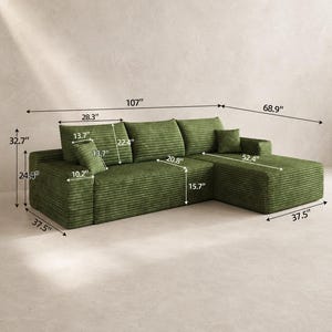 May include: A green corduroy sectional sofa with a chaise lounge, featuring three back cushions and two small square throw pillows. The sofa has a total width of 107 inches, a depth of 68.9 inches, a height of 32.7 inches, and a seat height of 15.7 inches.