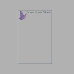 May include: A rectangular notepad with a gray background and a thin dark blue border. In the top left corner, there is a purple butterfly illustration. The text "Be you Do you For you" is printed in a dark blue handwritten script font.