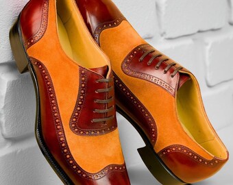 Handgjorda tvåfärgade oxfordskor i läder | Brändorange och vinröda brogues