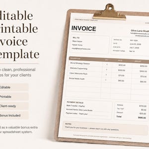 May include: An editable, printable invoice template on a clipboard. The document features sections for billing, itemized descriptions, payment details, and notes, with the text 'INVOICE', 'Olive Lane Studio', and various business transaction data visible.