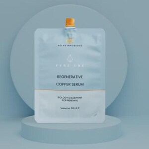 May include: A light blue pouch of "Regenerative Copper Serum" with the text "Pure Ore" and "Atlas Infusions". The pouch has a white bottom section and a gold-coloured cap. The volume is 50ml.