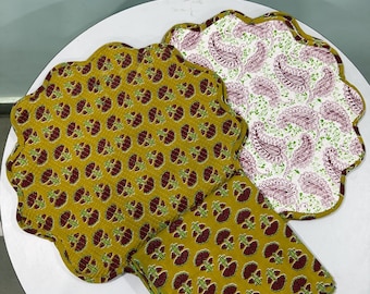 Quilted mets , reversible print, green colour, floral pattern.