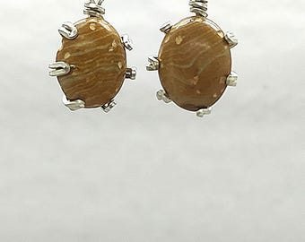 Exceptional gemstones sets in 6 prong silver
