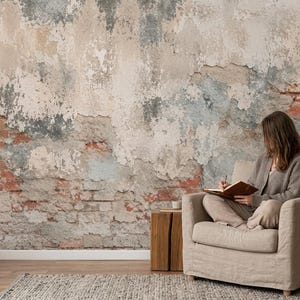 May include: A wall mural featuring a weathered, distressed brick wall with patches of peeling plaster in shades of gray, white, and muted blue. The texture reveals exposed red brick underneath, creating a rustic, industrial aesthetic for interior decor.