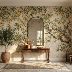 Watercolor fresco-style wallpaper mural featuring an ancient gnarled lemon tree with sprawling twisted branches heavy with ripe yellow lemons, dark green leaves, and delicate white citrus blossoms against a warm aged stone and crumbling plaster wall texture in cream and sandy beige tones. Mediterranean Italian botanical aesthetic. Peel and stick non woven removable fruit tree wallpaper design.