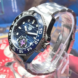 Reloj de hombre Tag Heuer Aquaracer GMT Date automático vintage con corona firmada, restaurado.