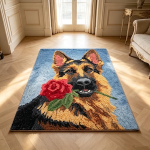 May include: A rectangular area rug featuring a tufted design of a German Shepherd dog with black, tan, and brown fur. The dog is holding a vibrant red rose with green leaves in its mouth against a textured light blue background.