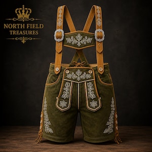 May include: Olive green leather lederhosen featuring mustard yellow suspenders with silver buckles and white floral embroidery on the front bib, pockets, and legs. The text NORTH FIELD TREASURES with a crown icon is visible in the upper left corner.