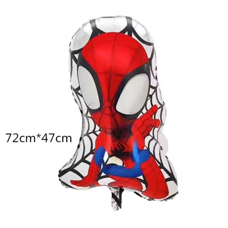 May include: A foil balloon shaped like a cartoon character with a red and blue suit, large white eyes, and a black spider web pattern across the background. The balloon measures 72cm by 47cm, as indicated by the text printed on the left side.