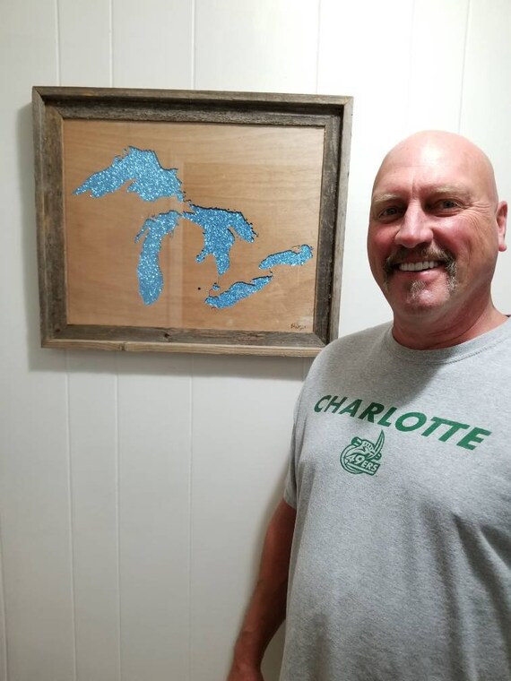 Woodcut of the Great Lakes Hand cut carving of the Great Lakes Scroll sawn woodcut of the Great Lakes.