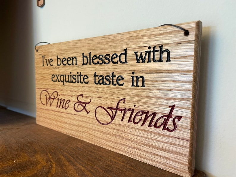 Carved plaque in rustic reclaimed plywood. I've been blessed with Exquisite taste in Wine & Friends image 4