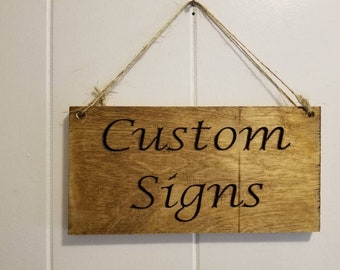 Custom made signs.  Custom carved wooden signs. Wooden signs. Custom plaques. Wood plaques. Personalized wooden signs. Reclaimed wood signs.