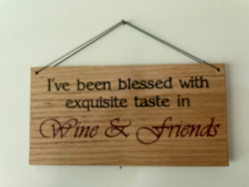 Carved plaque in rustic reclaimed plywood. I've been blessed with Exquisite taste in Wine & Friends image 2