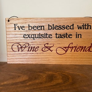 Carved plaque in rustic reclaimed plywood. I've been blessed with Exquisite taste in Wine & Friends image 1