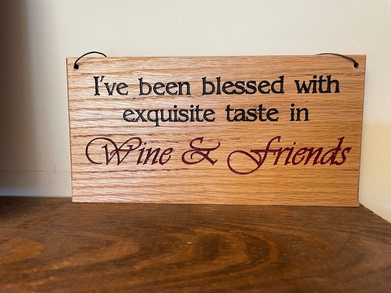 Carved plaque in rustic reclaimed plywood. I've been blessed with Exquisite taste in Wine & Friends image 1
