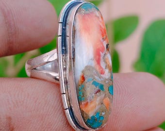 Anel oval artesanal em cobre com turquesa e formato de ostra, em prata de lei, estilo boho.