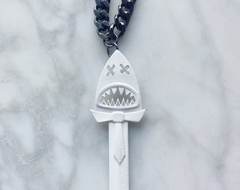 Black n white enamel shark sword necklace