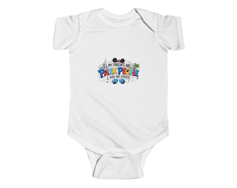 May include: A white short-sleeved baby bodysuit featuring a colorful graphic print that reads MY PARENTS ARE PARK PEOPLE I HAD NO CHOICE. The design includes illustrations of a castle, a palm tree, mouse ears, and blue aviator sunglasses.