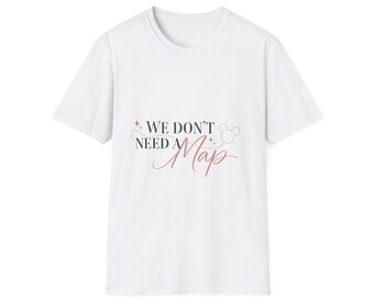 May include: A white short-sleeved t-shirt featuring the black and pink text "WE DON'T NEED A Map" printed on the chest. The design includes a dotted line, small star icons, and a circular outline resembling a mouse head silhouette.