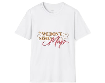 May include: A white short-sleeved t-shirt featuring the gold and pink text WE DON'T NEED A Map on the chest. The design includes a gold dotted line, small star accents, and a gold outline of a mouse head icon integrated into the lettering.