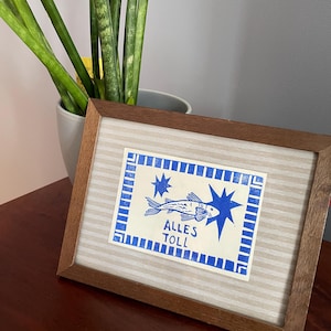 Tutto perfetto! Linoleografia realizzata a mano, motivo di pesci e stelle.